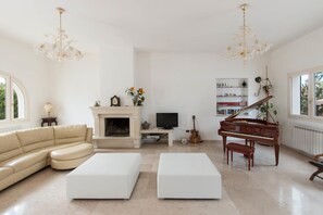 Villa, 4 Bedrooms | Living room | TV, fireplace, DVD player