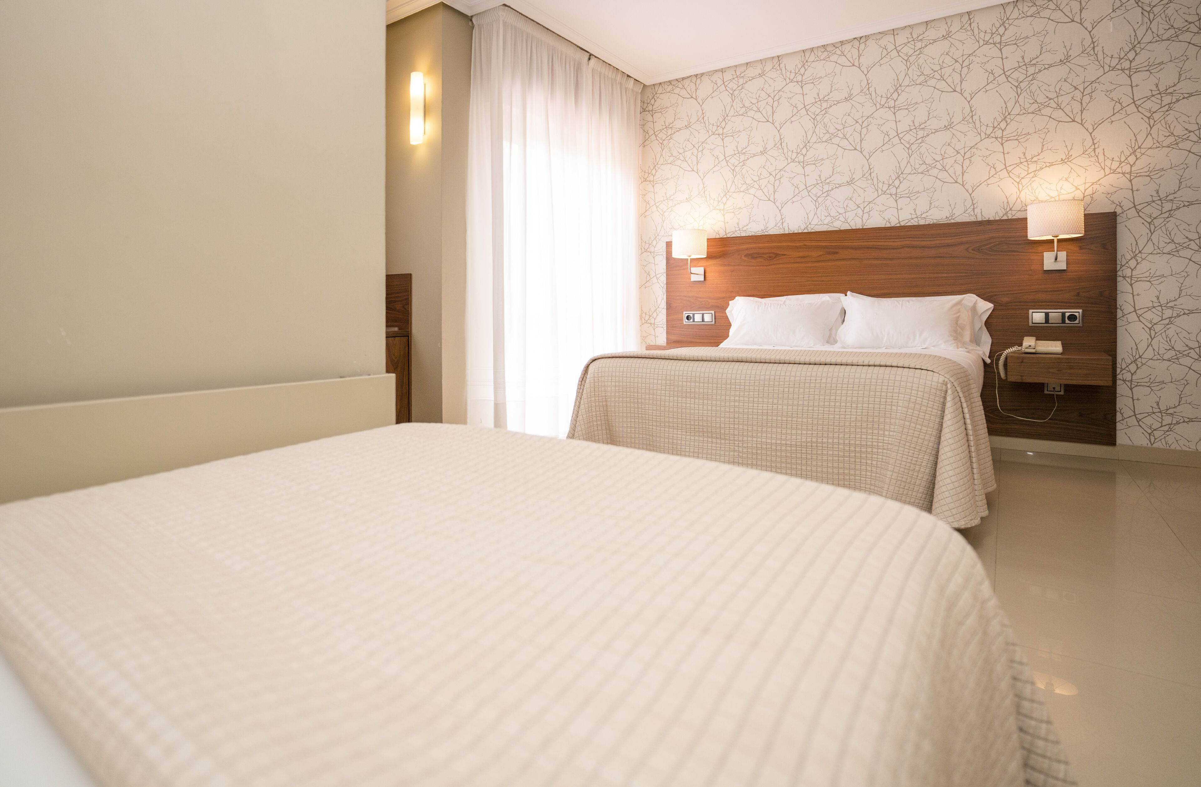 family room | desk, laptop workspace, blackout curtains, free cots/infant beds