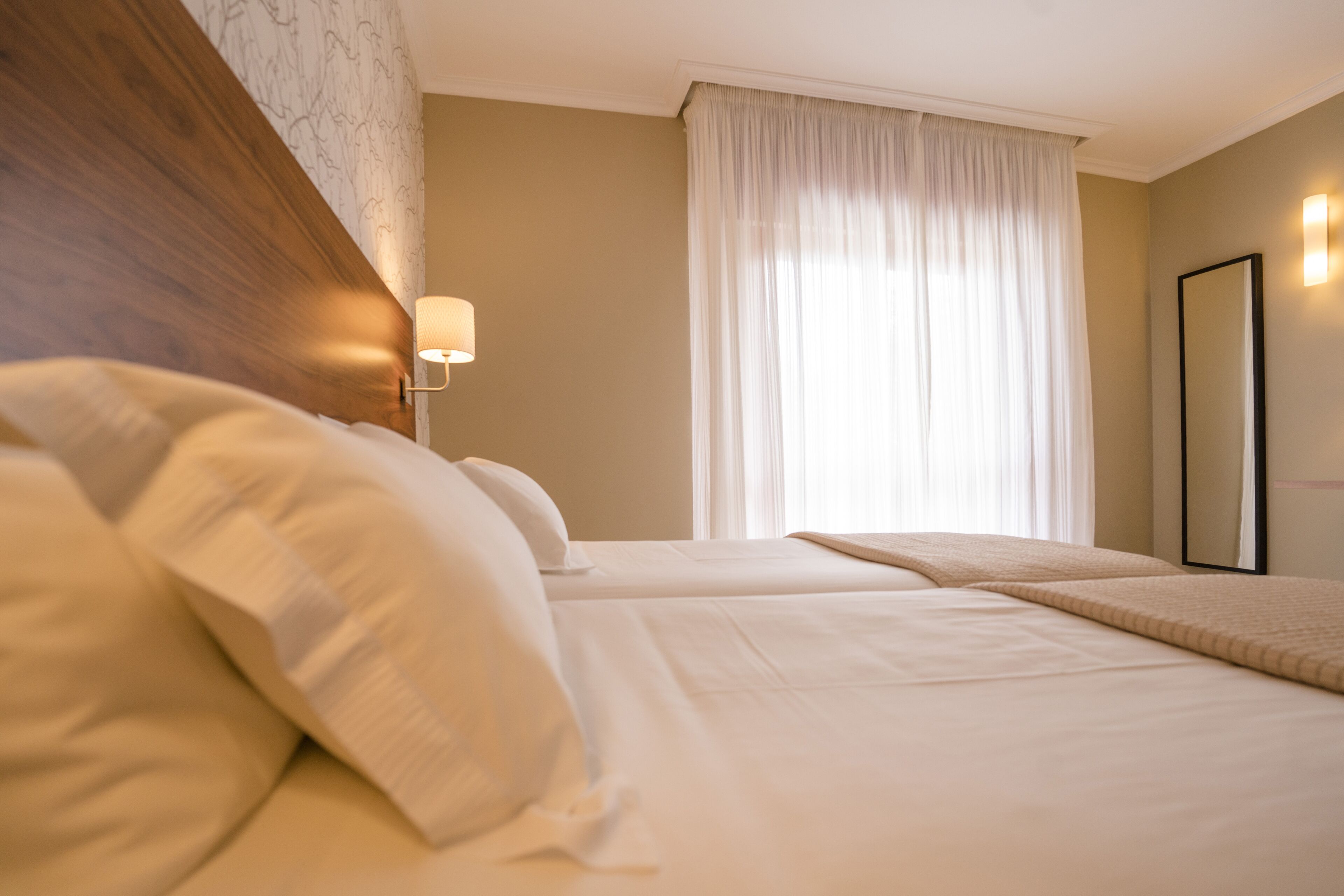 desk, laptop workspace, blackout curtains, free cots/infant beds