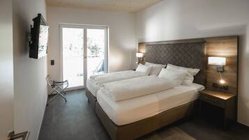 Suite Confort | Coffres-forts dans les chambres, fer et planche à repasser