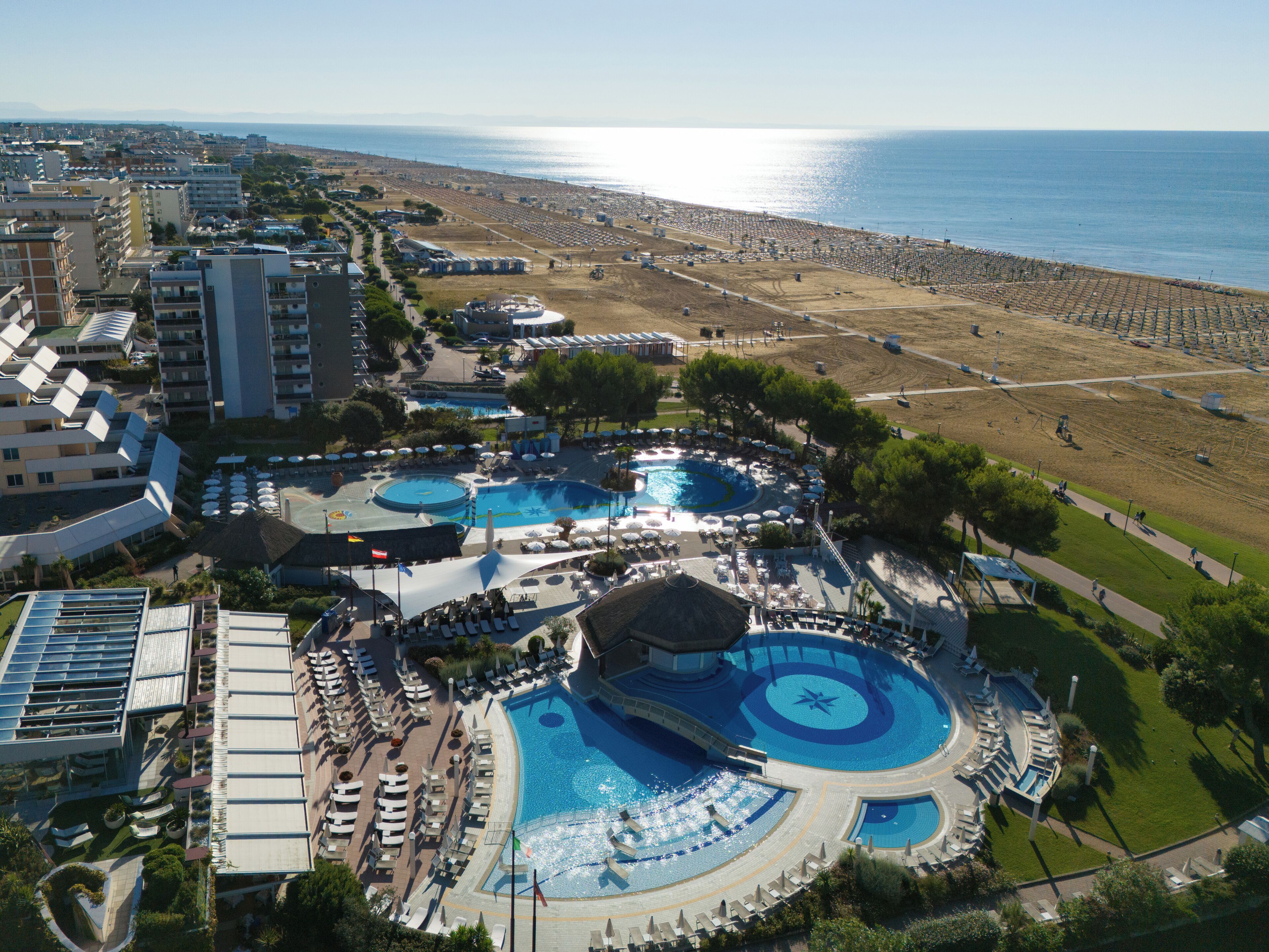 Seasonal outdoor pool, pool umbrellas, sun loungers