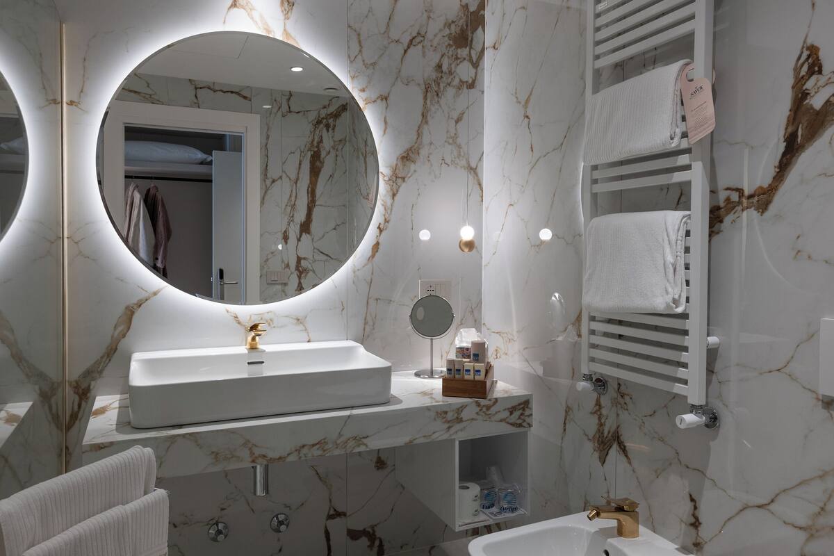 suite (spa) | bathroom | shower, hair dryer, bathrobes, slippers