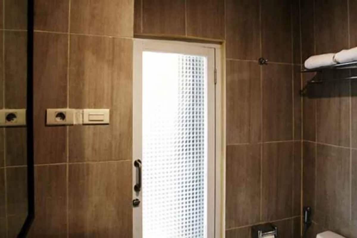 Shower, free toiletries, slippers, towels