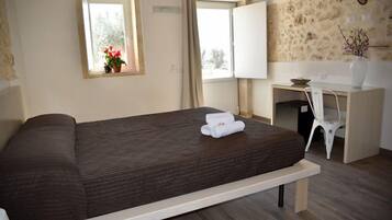 Premium bedding, desk, blackout curtains, soundproofing