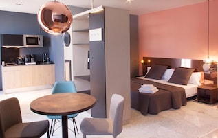 Classic Studio, Balcony | Living area | 32-inch flat-screen TV with satellite channels, TV
