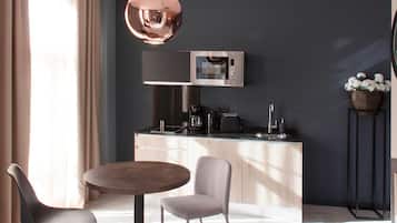 Studio, Balcony | Private kitchen | Full-sized fridge, microwave, stovetop, coffee/tea maker