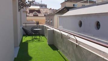 Apartamento superior, terraza | Terraza o patio
