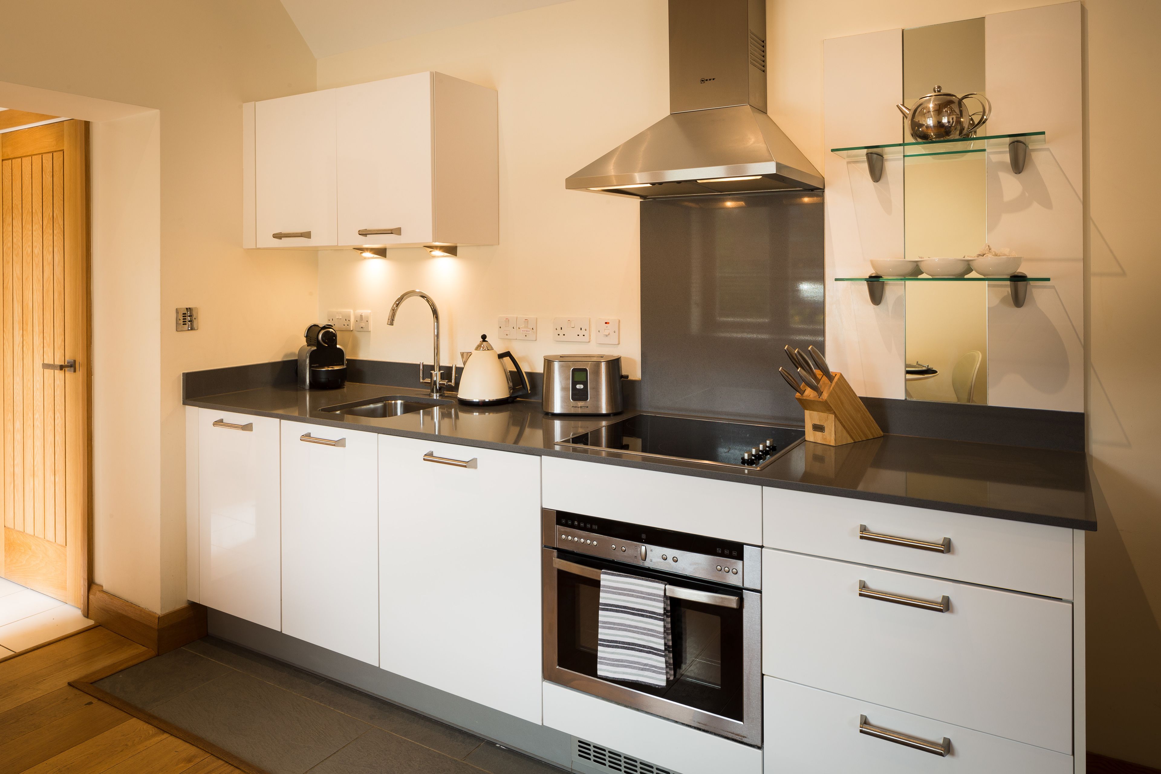 luxury apartment, 1 double bed, ground floor (#1) | private kitchen | full-sized fridge, microwave, stovetop, dishwasher