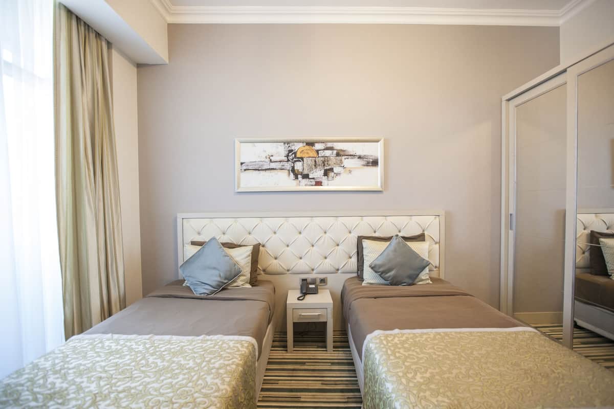 Economy-Zweibettzimmer | 1 Schlafzimmer, Minibar, Zimmersafe, Schreibtisch