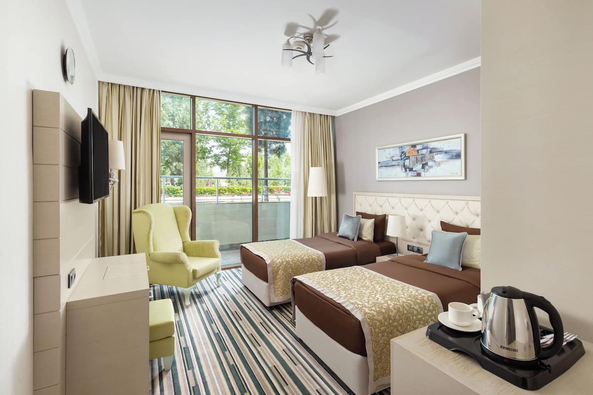 Economy-Zweibettzimmer | 1 Schlafzimmer, Minibar, Zimmersafe, Schreibtisch