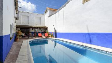 Outdoor pool, pool umbrellas, pool loungers