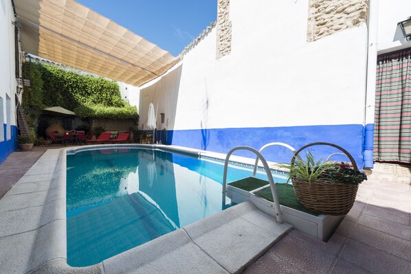 Outdoor pool, pool umbrellas, pool loungers