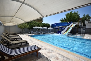 Seasonal outdoor pool, pool umbrellas, pool loungers