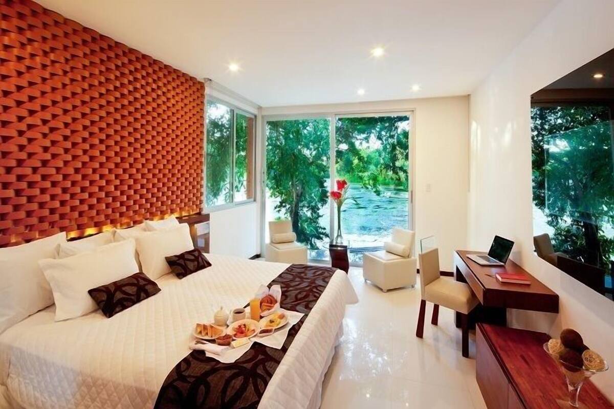 Suite ejecutiva, 1 habitación, vistas al jardín | Minibar, tabla de planchar con plancha, cunas (de pago)