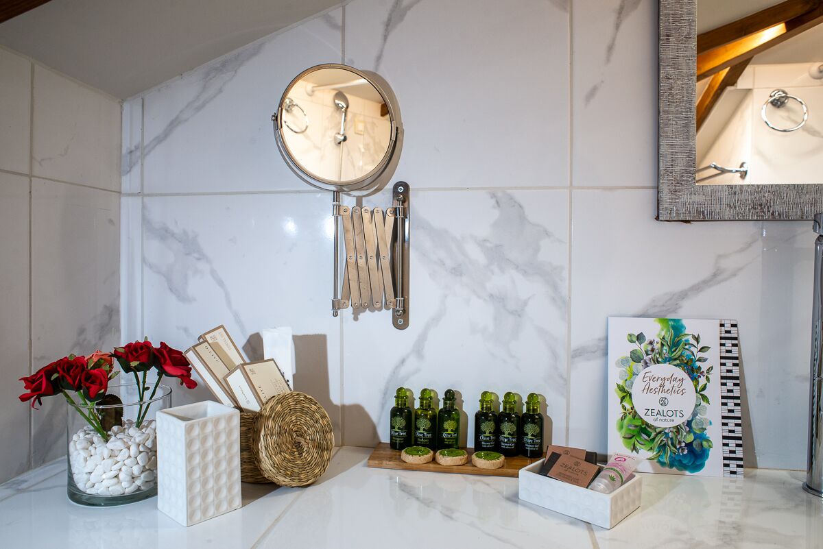 junior suite | bathroom | shower, hydromassage showerhead, designer toiletries, hair dryer