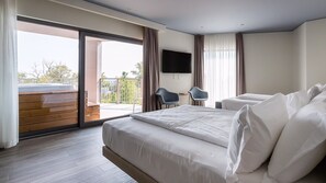 Suite exclusiva | Edredones de plumas, caja fuerte, wifi gratis y ropa de cama