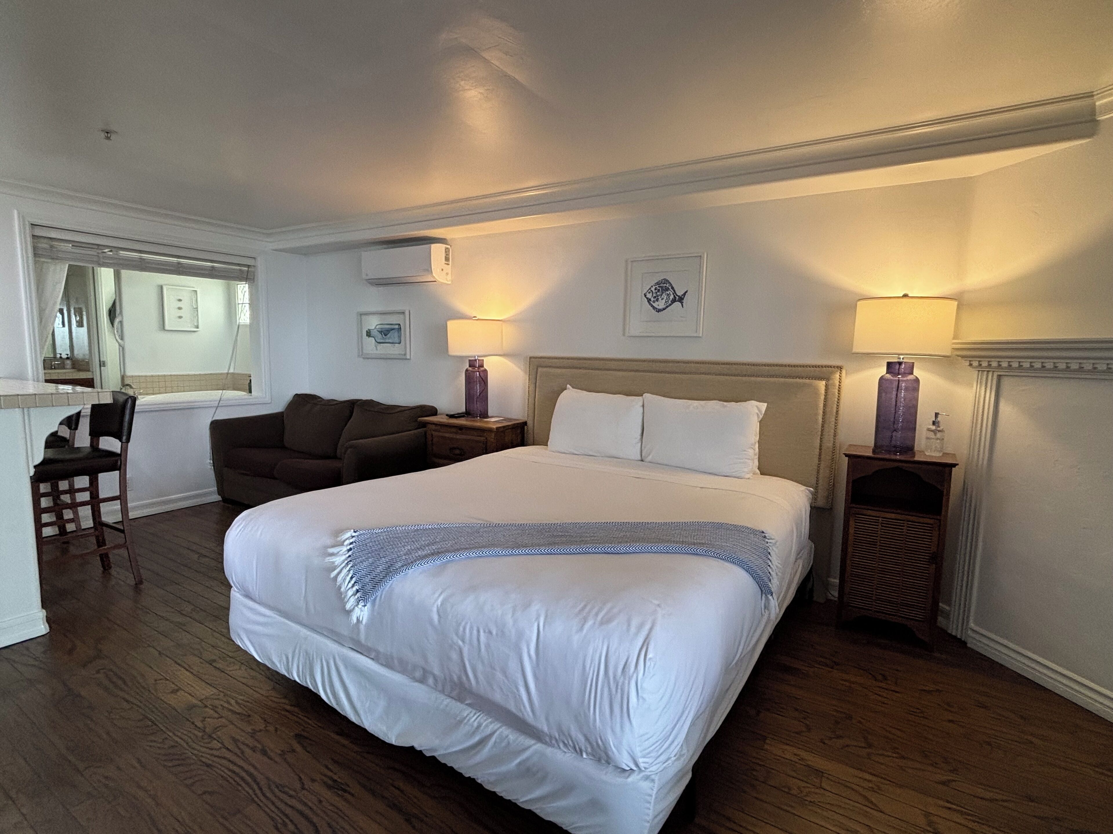 room, 1 king bed, fireplace, partial ocean view | 1 bedroom, travel cot, rollaway beds, bed sheets