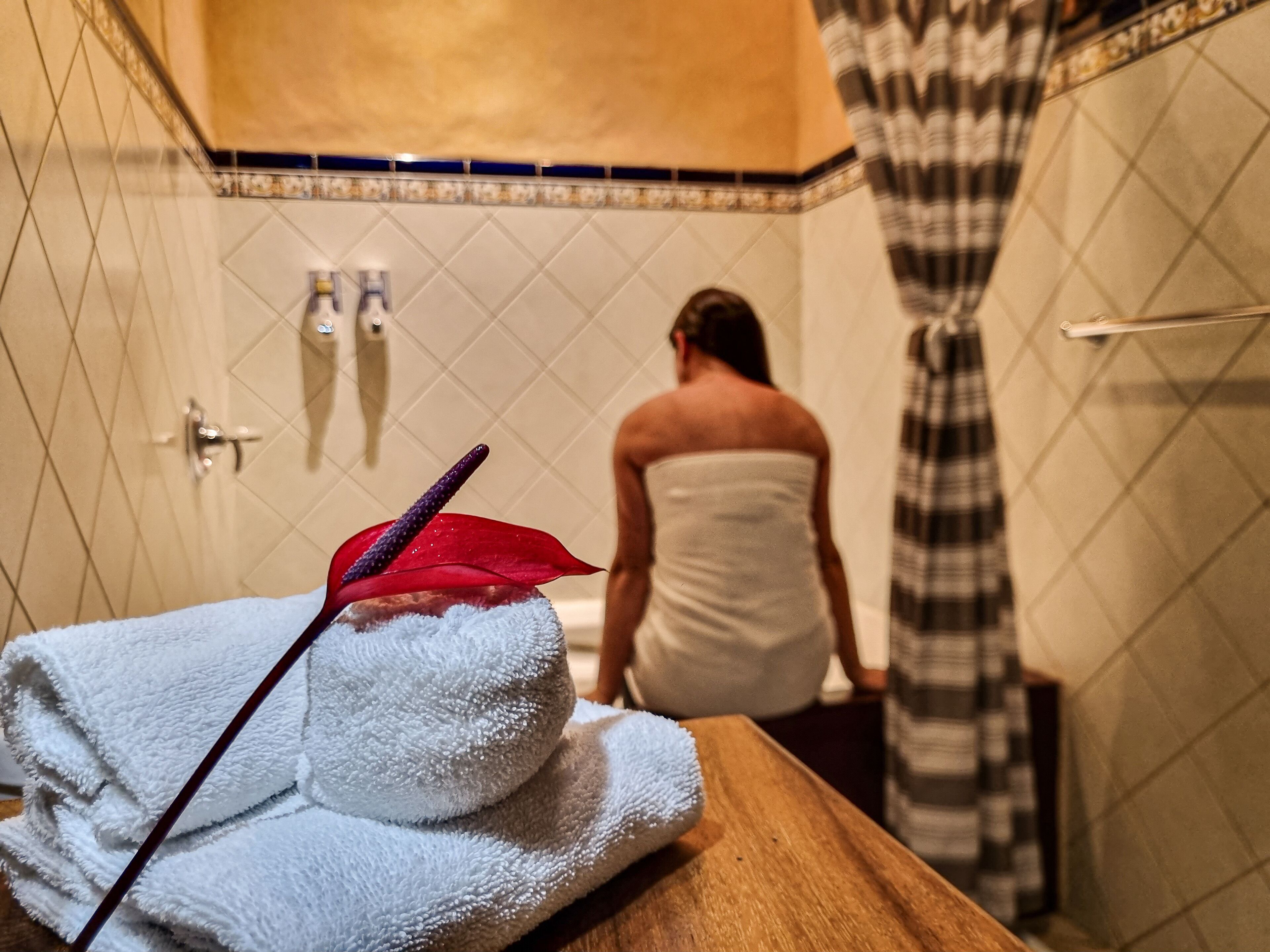 deluxe room, jetted tub | bathroom | hair dryer, towels