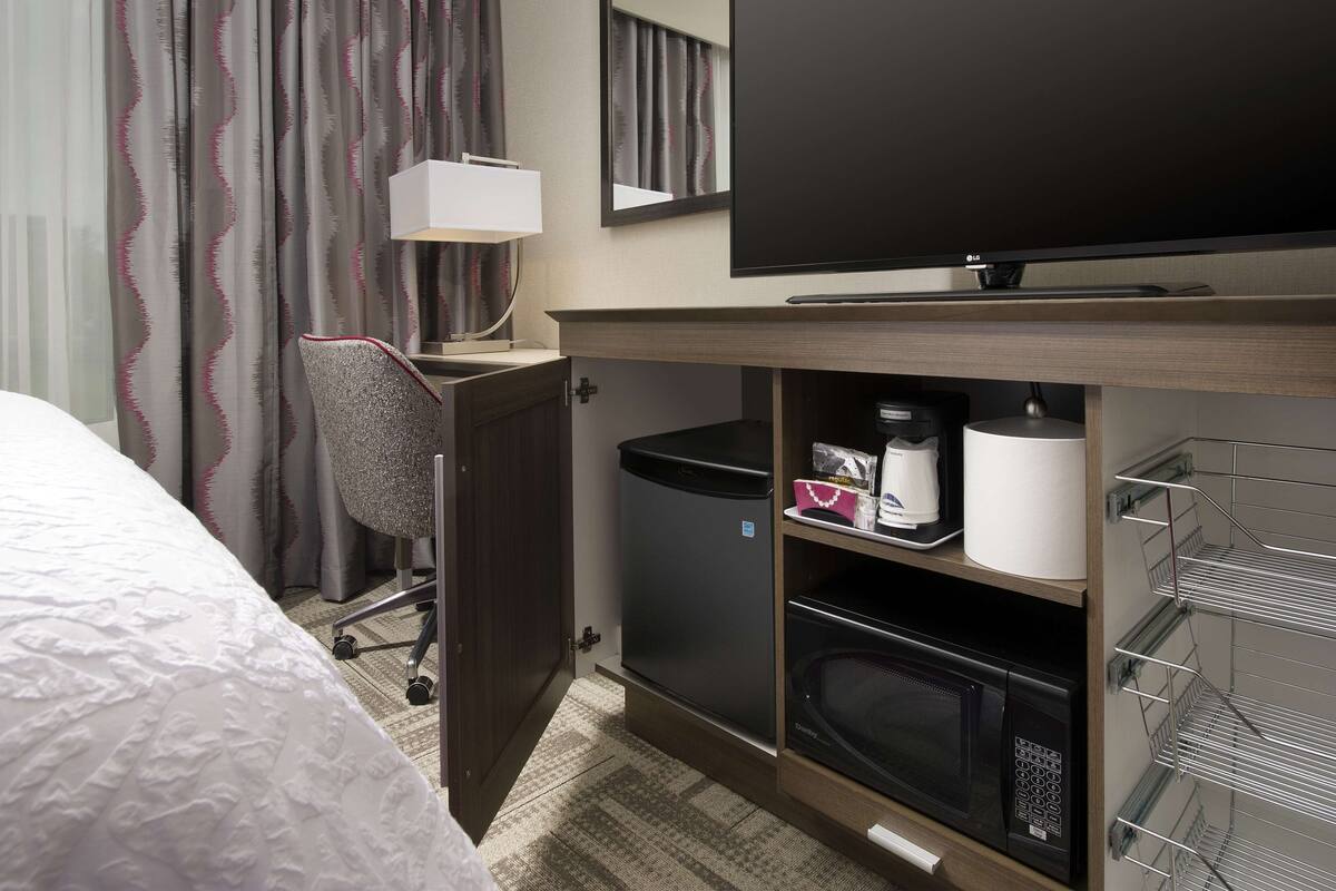 premium bedding, desk, laptop workspace, blackout curtains