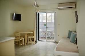 Economy Apartment | Living area | Flat-screen TV - Aelia Apartments (Andros)