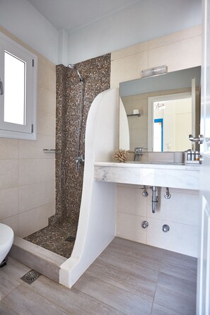 Deluxe Double Room | Bathroom | Shower, designer toiletries, hair dryer, towels - Aelia Apartments (Andros)