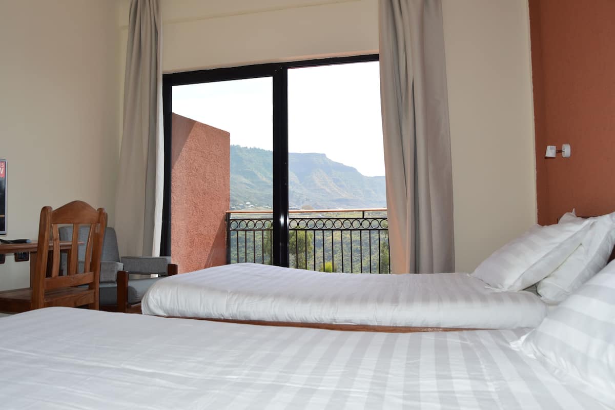 double or twin room, mountain view | premium bedding, down duvets, in-room safe, desk