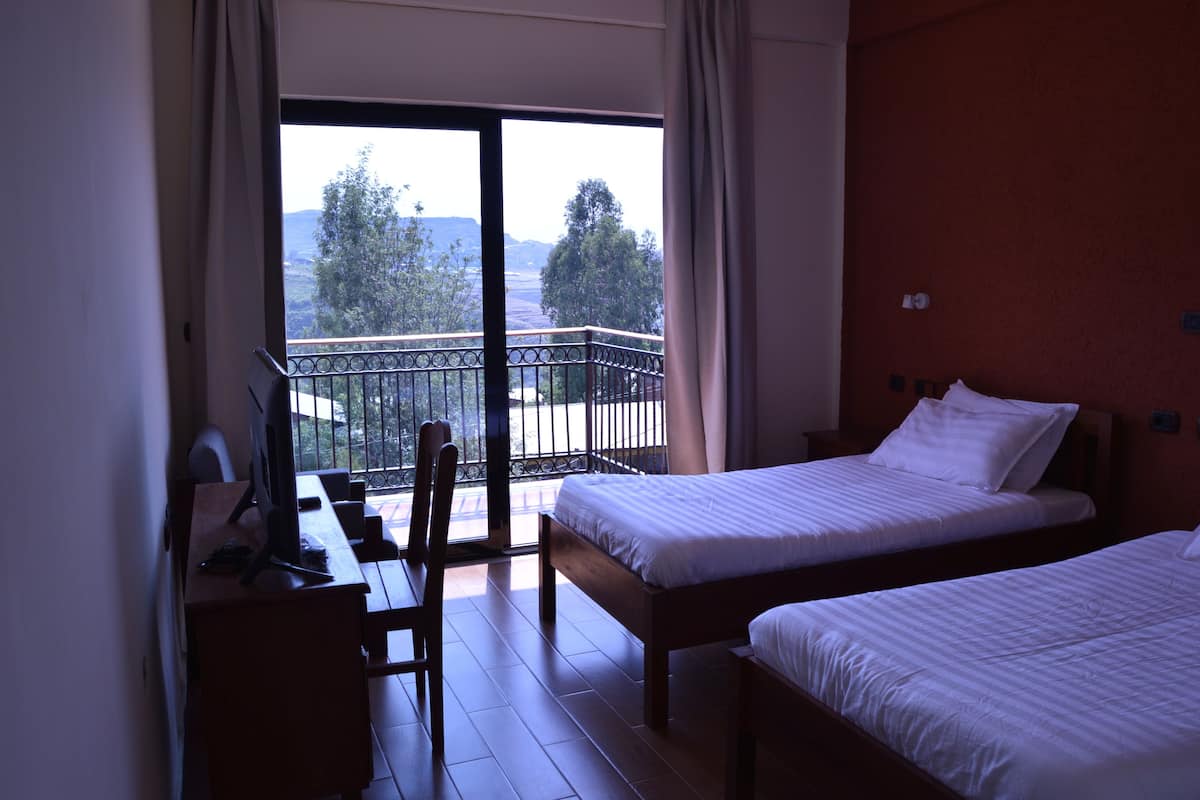 double or twin room, mountain view | premium bedding, down duvets, in-room safe, desk