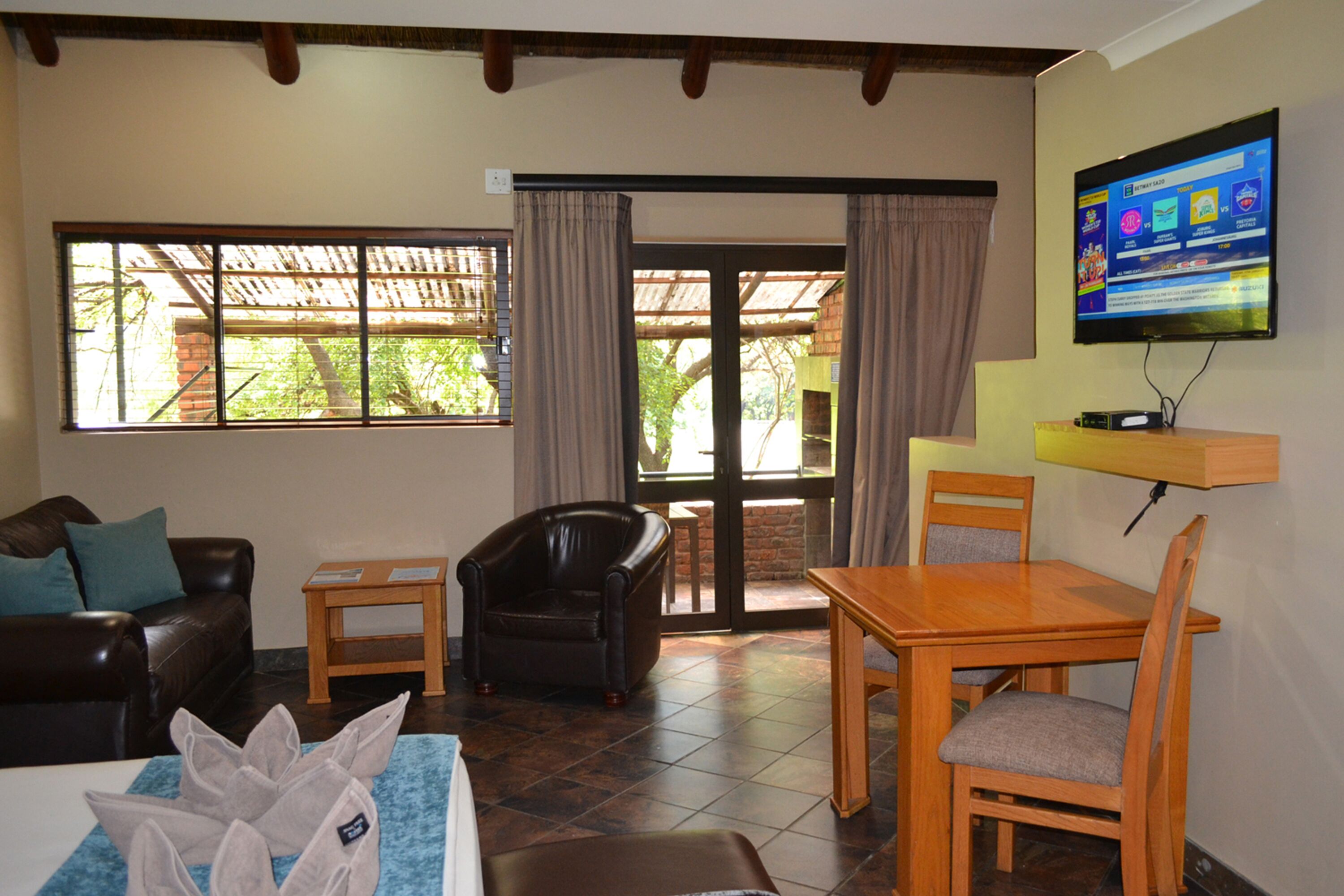 studio chalet with patio | television