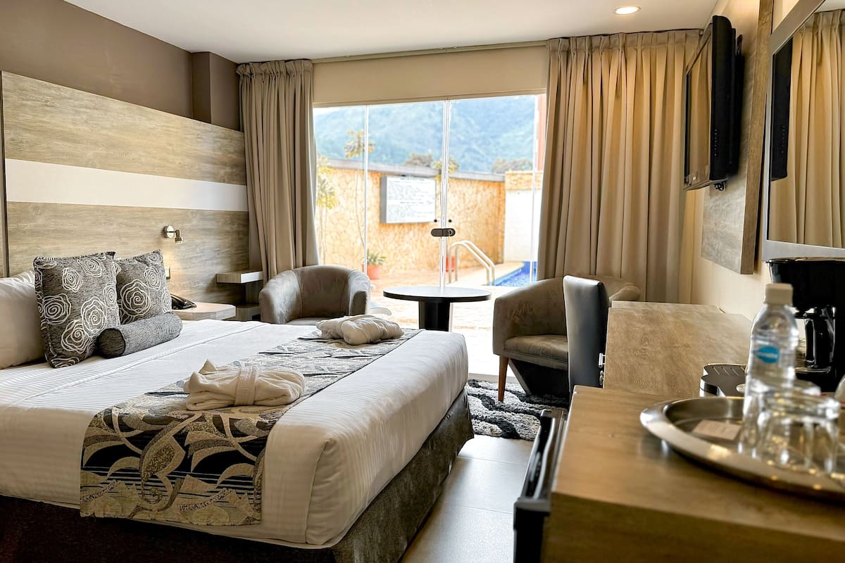 In-room safe, desk, laptop workspace, blackout curtains