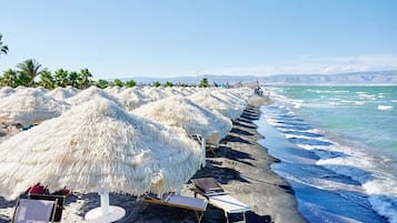 Private beach, beach umbrellas