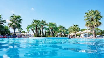 Seasonal outdoor pool, pool umbrellas, pool loungers