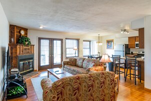 Deluxe Condo, 2 Bedrooms | Living area | 42-inch flat-screen TV with cable channels, TV, DVD player