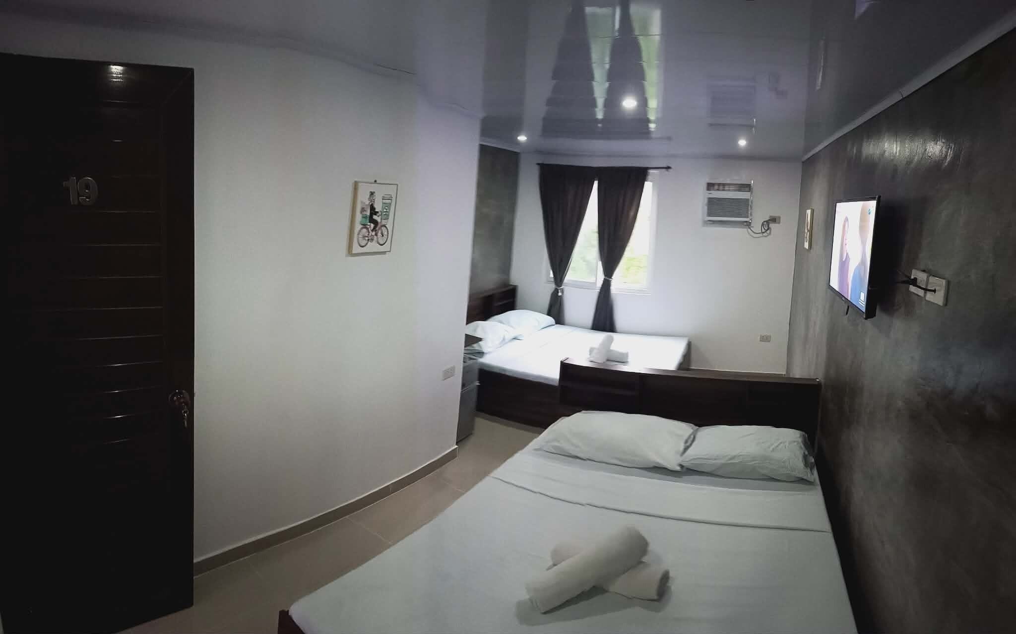 Phòng, 2 giường cỡ queen | Truy cập Internet không dây miễn phí 