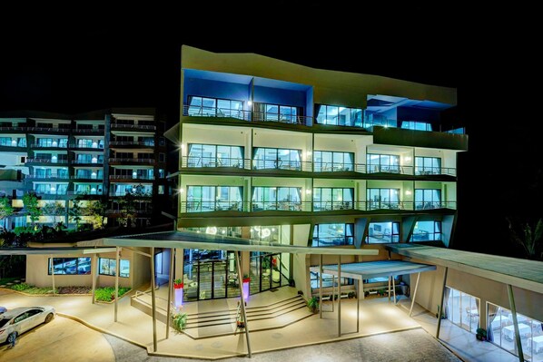 Guests can enjoy outdoor space from each floor's balconies.