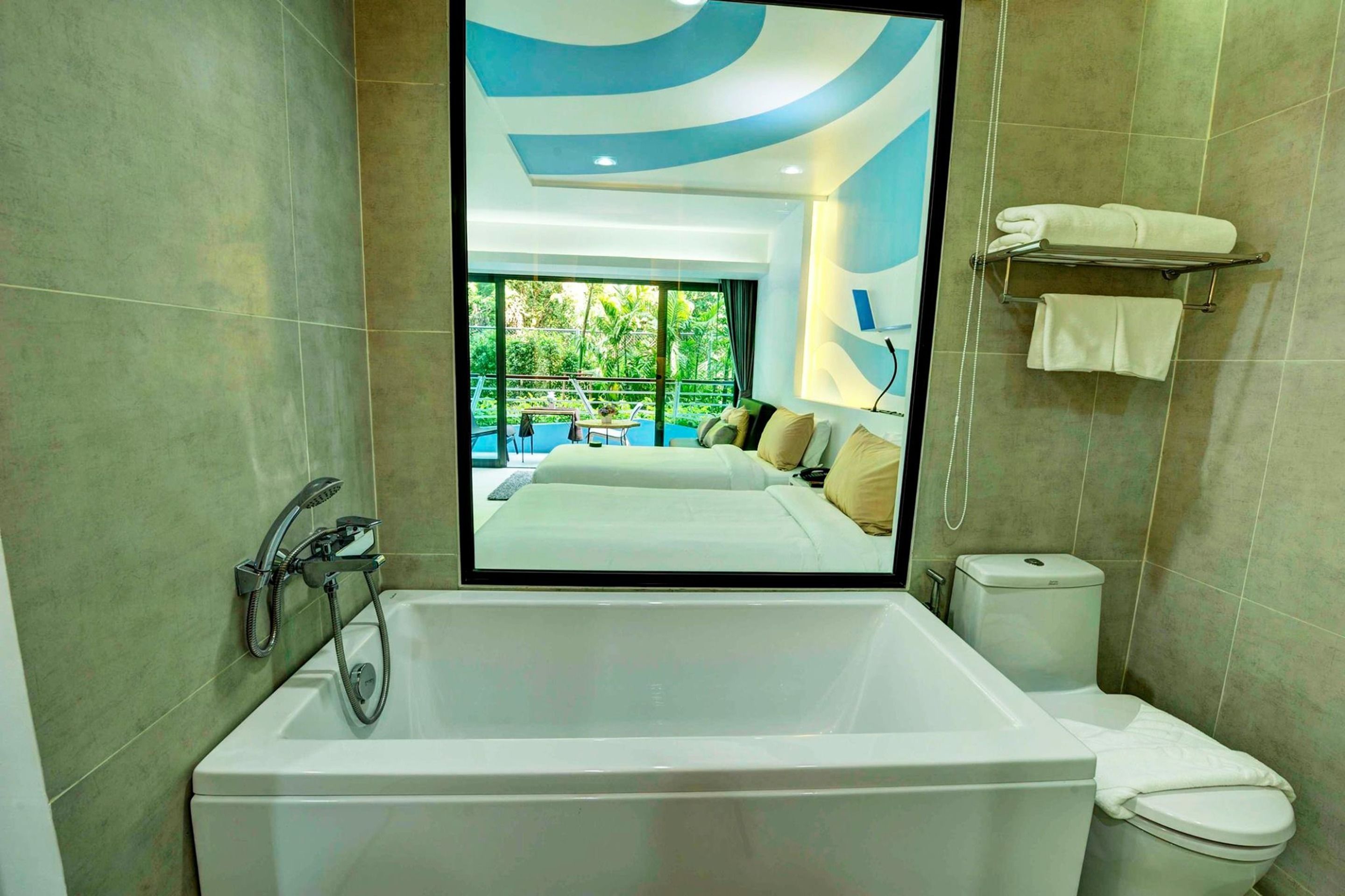 separate bathtub and shower, free toiletries, hair dryer, bathrobes