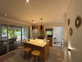 Garden Bungalow (Mezzanine room with fan) | Private kitchen | Full-size fridge, microwave, oven, stovetop