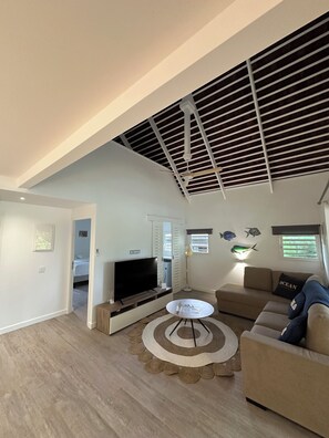 Bungalow Familial, 3 chambres, vue jardin (Mezzanine room with fan) | Coin séjour