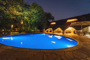 Outdoor pool, pool umbrellas, sun loungers