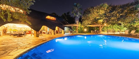 Outdoor pool, pool umbrellas, pool loungers