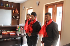 A bar area with bottles and snacks. - Hotel Dream City (Kathmandu)