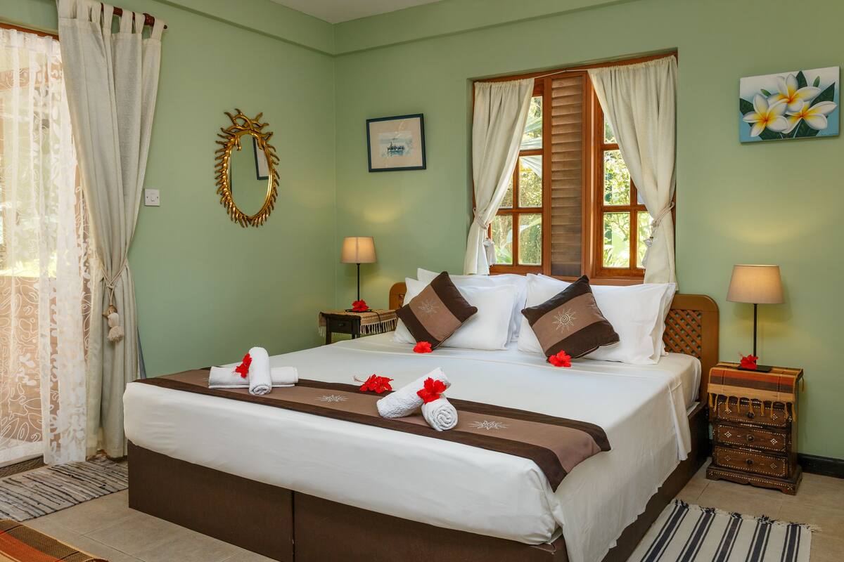 Cinnamon Mini Suite | Pillowtop beds, in-room safe, blackout drapes