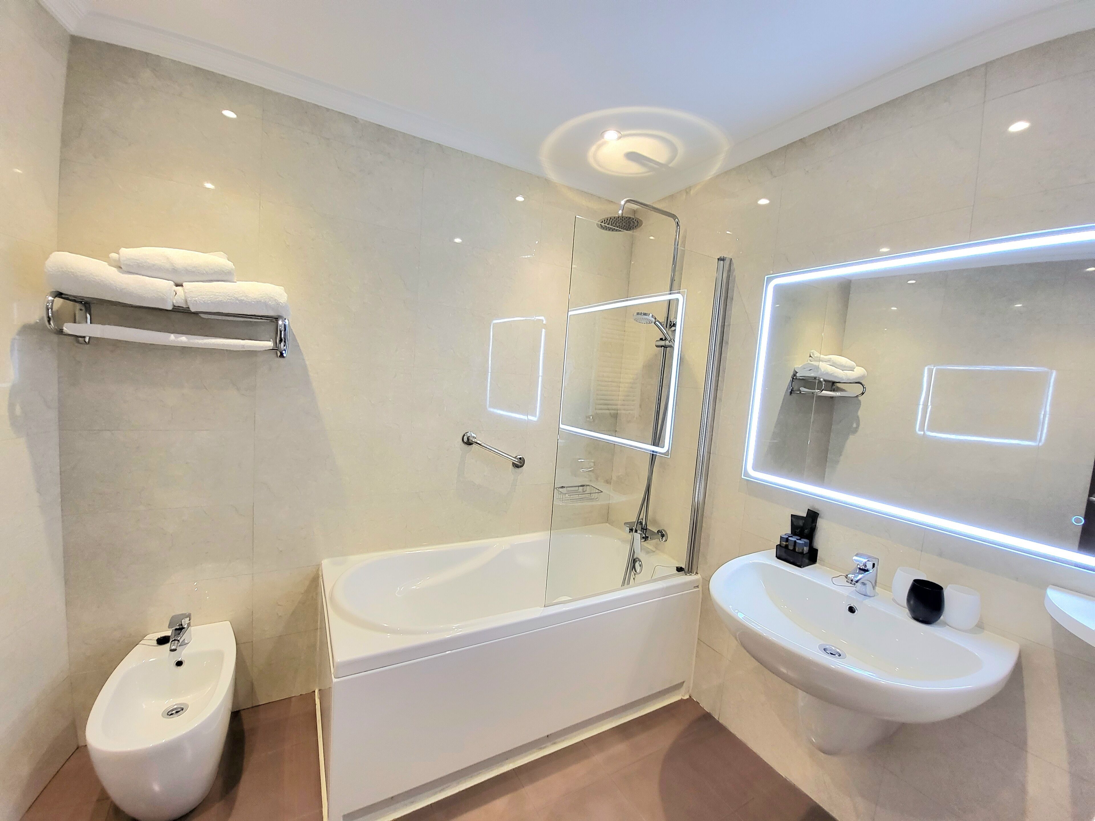 free toiletries, hair dryer, bidet, towels