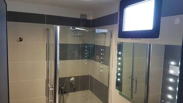 Shower, free toiletries, hair dryer, bathrobes