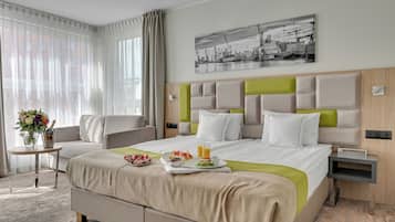 Habitación superior con 1 cama doble o 2 individuales | Minibar, caja fuerte, escritorio y cortinas opacas