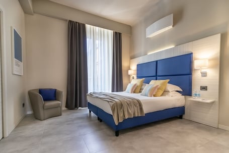 1 habitación, ropa de cama de alta calidad, cubrecamas y minibar