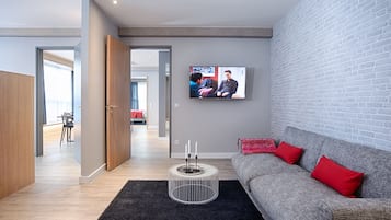 40-inch flat-screen TV with satellite channels, TV