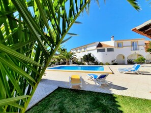 Outdoor pool, sun loungers