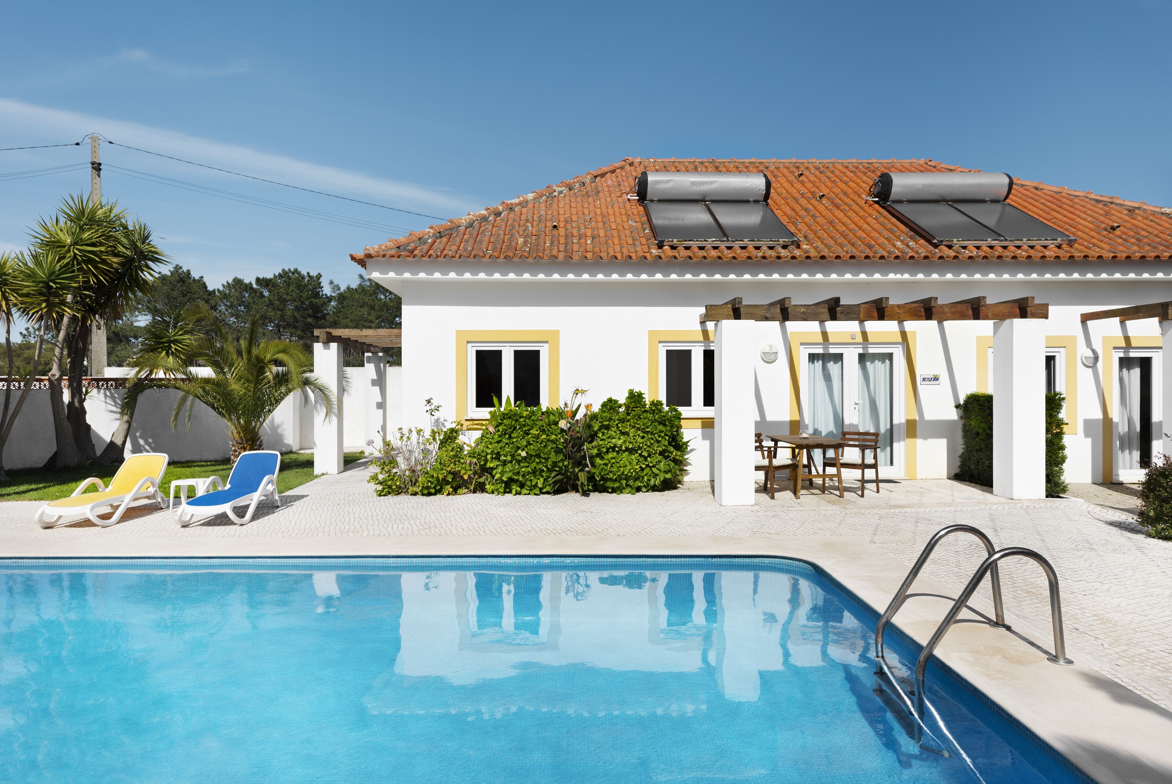 outdoor pool, pool loungers