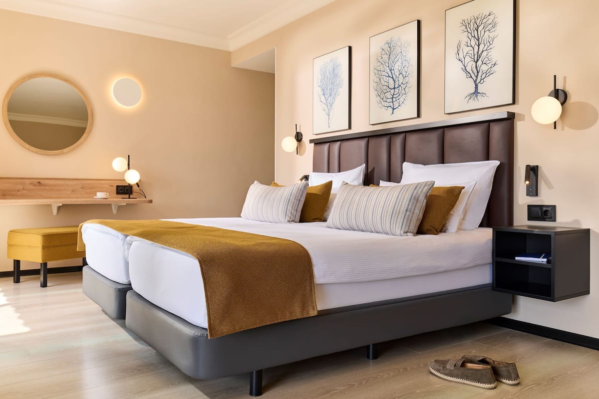 Junior Suite (Classic) | 1 bedroom, in-room safe, free cots/infant beds, free WiFi