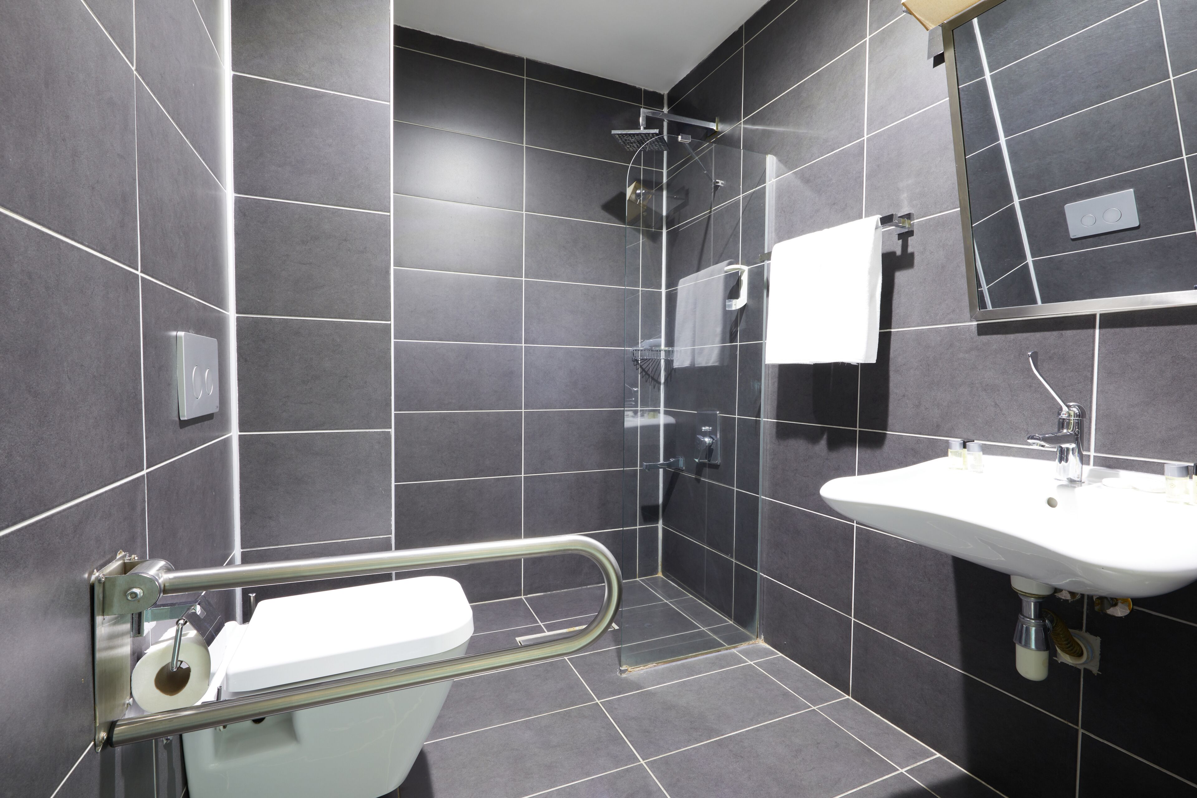 superior double room | bathroom | shower, rainfall showerhead, free toiletries, hair dryer
